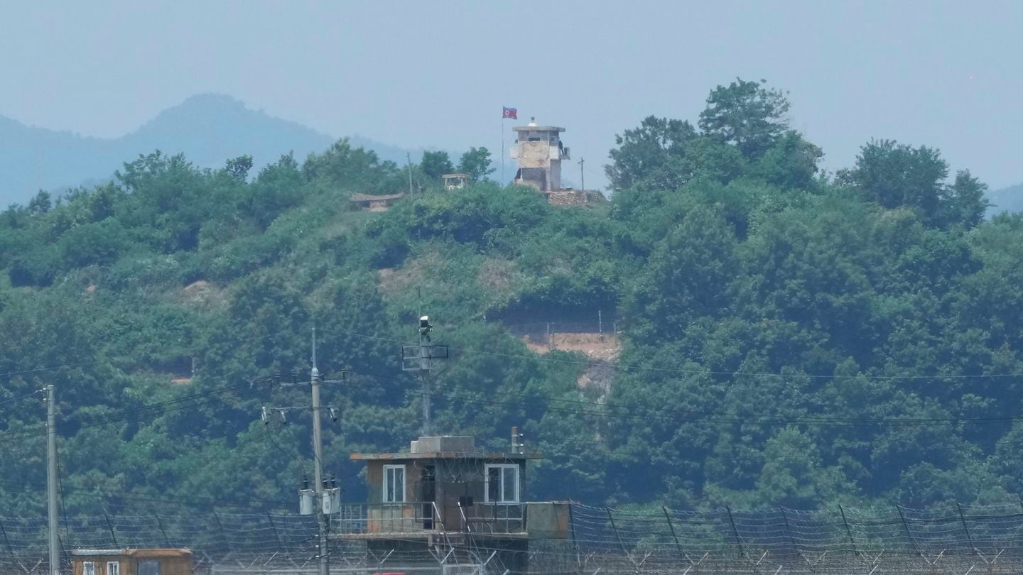 A North Korean military guard post, top, and a South Korean post, bottom, are seen from Paju, South Korea, near the border with North Korea, on June 18.